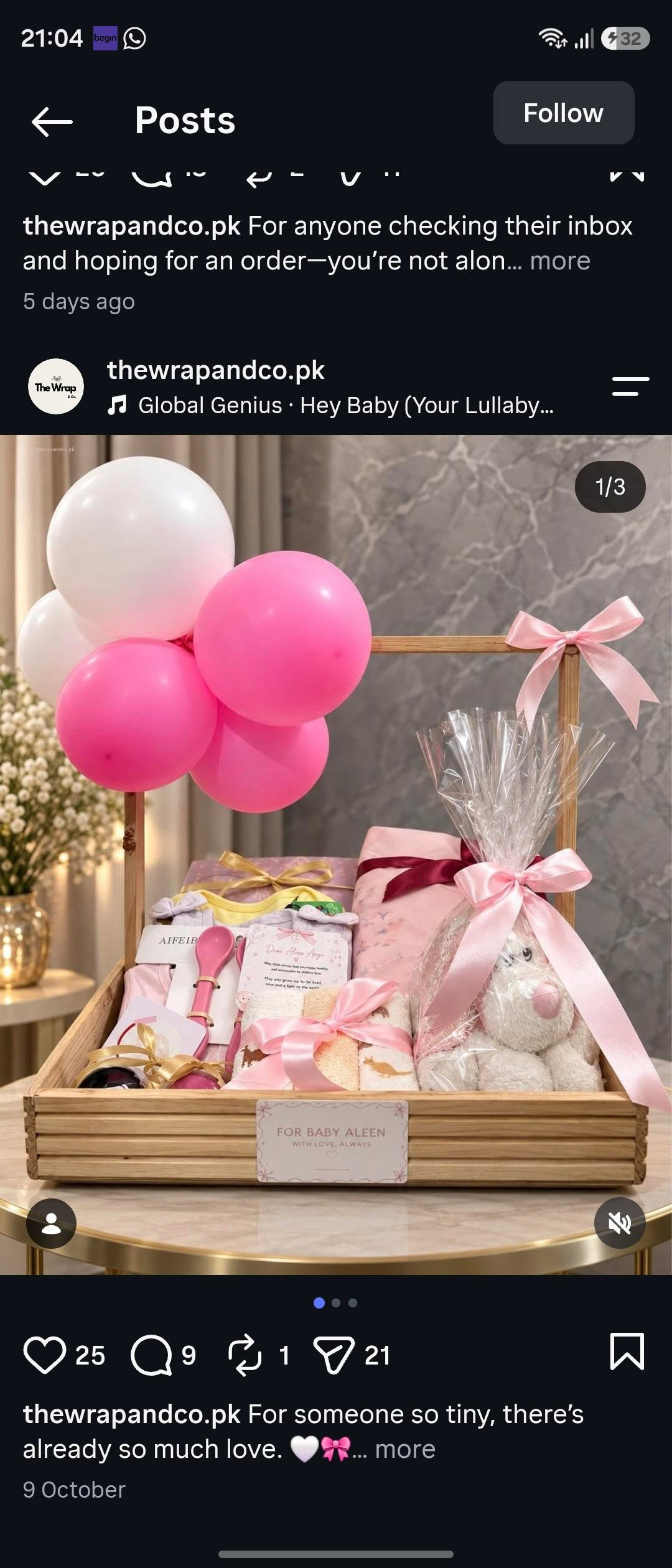 Pink newborn gift crate with baby essentials, a soft toy, satin bows and balloons